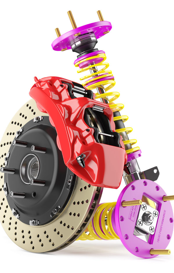 Automobile Braking System And Shock Absorbers Group of auto parts. Automobile braking system. Aeration steel brake disk with perforation and red six pistons calipers and pads. Set of tuning suspension shock absorbers with yellow springs. Isolated on white background 3d.