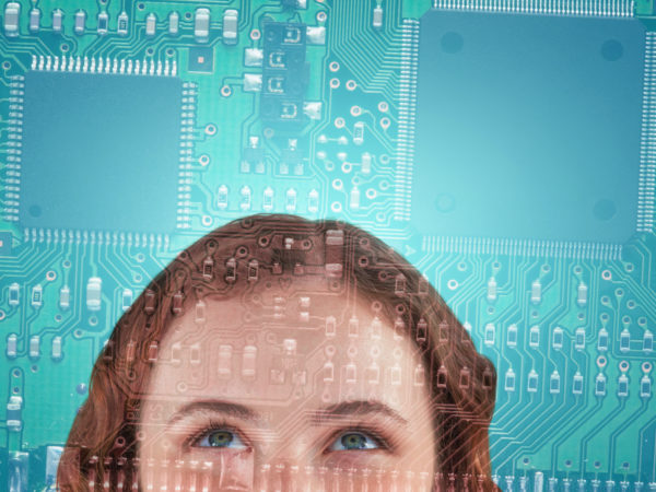 Cropped image of beautiful woman looking up against printed circ Cropped image of beautiful woman looking up against printed circuit board